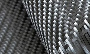 碳纖維是合成材料還是復(fù)合材料？